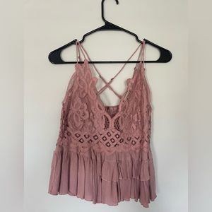 Free People flowy mauve tank top with adjustable straps. Size Medium